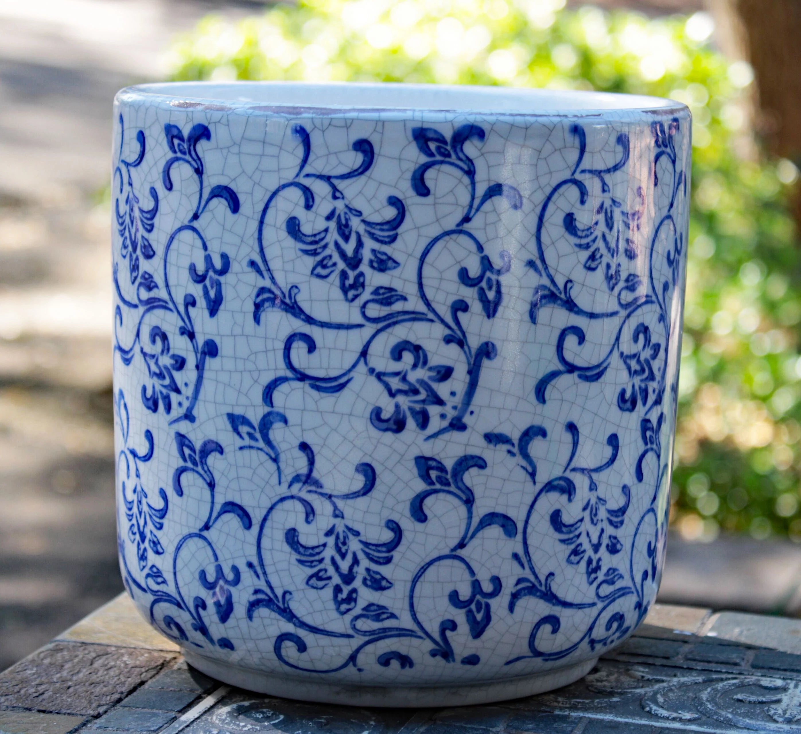 Blue and white ceramic cylindrical garden planter with vine pattern L9580