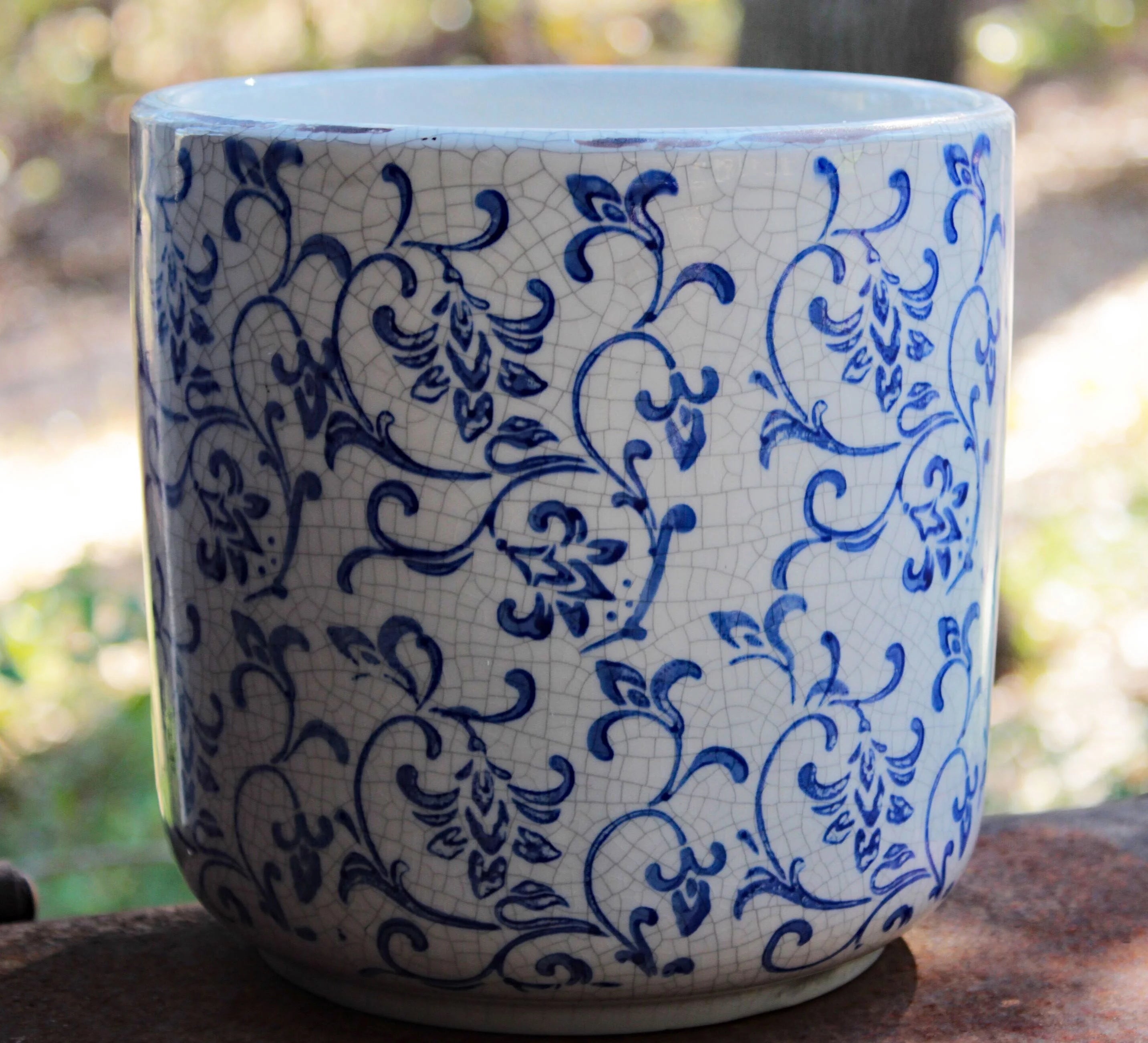 Blue and white ceramic cylindrical garden planter with vine pattern L9580